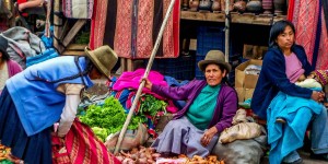 A Day in Peru’s Sacred Valley Vendors at the Sunday market in Pisac, one of the great places to visit in Peru's Sacred Valley