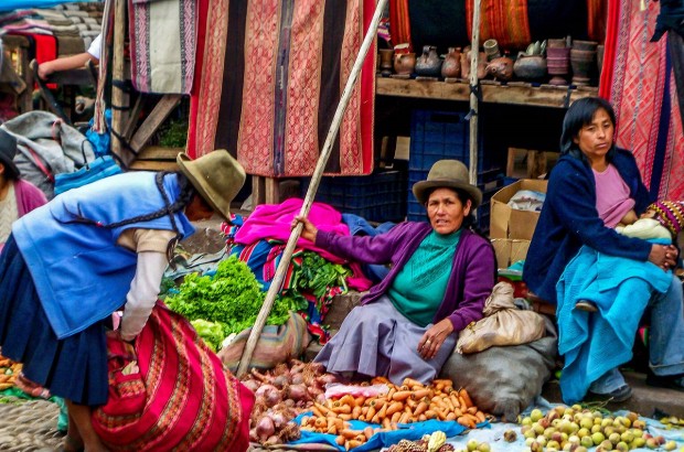 A Day in Peru’s Sacred Valley Vendors at the Sunday market in Pisac, one of the great places to visit in Peru's Sacred Valley