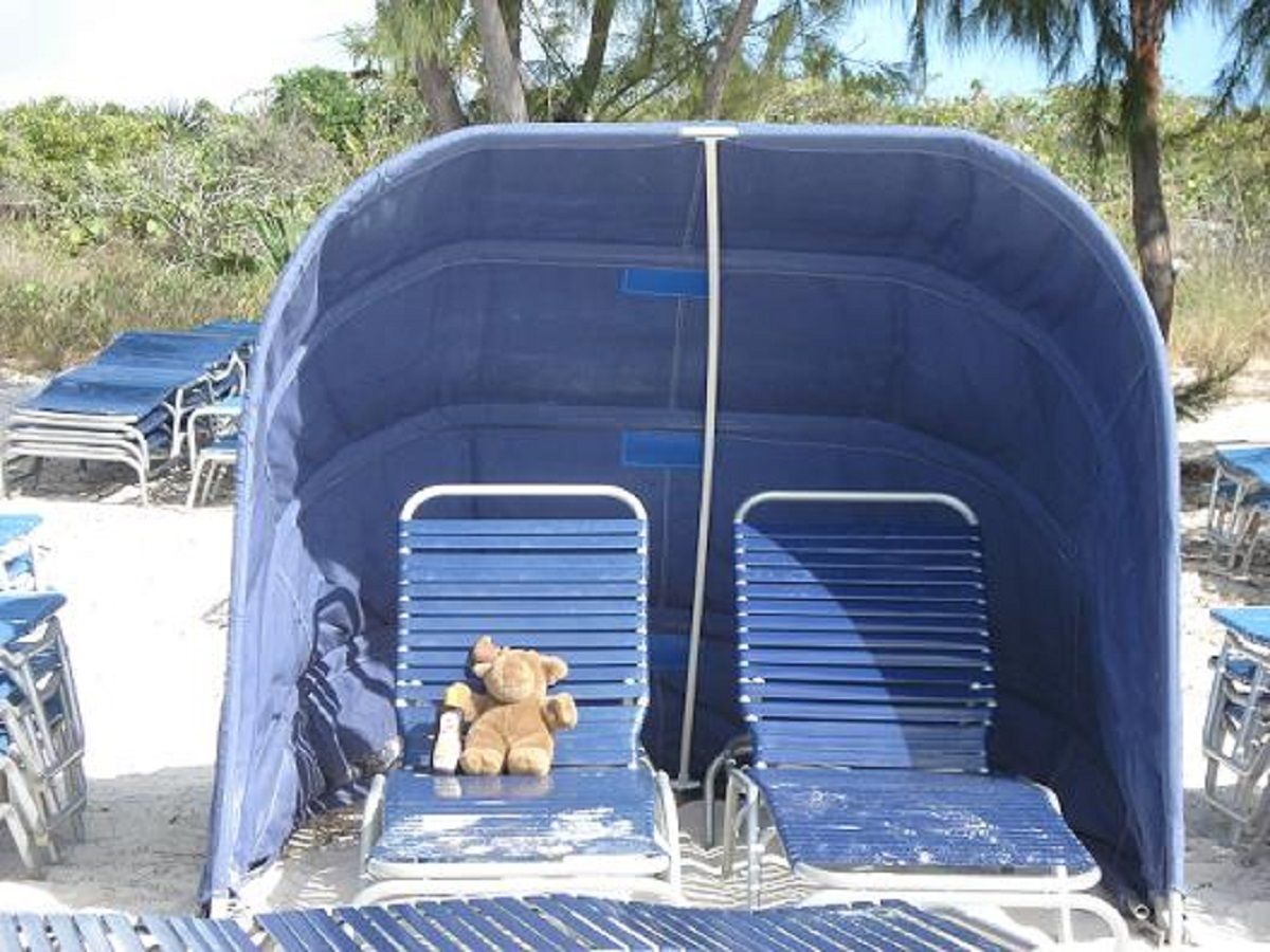 Our favorite Half Moon Cay Bahamas excursions option is the clamshell sunshade rental for two people. You can adjust throughout the day as the sun shifts.