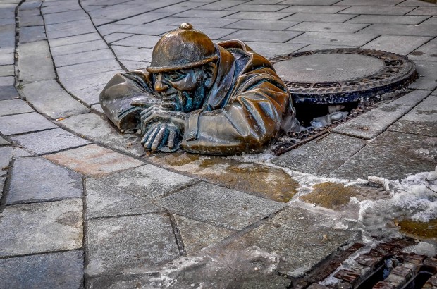 A Day Trip to Charming Bratislava, Slovakia Manhole statue in Bratislava, Slovakia
