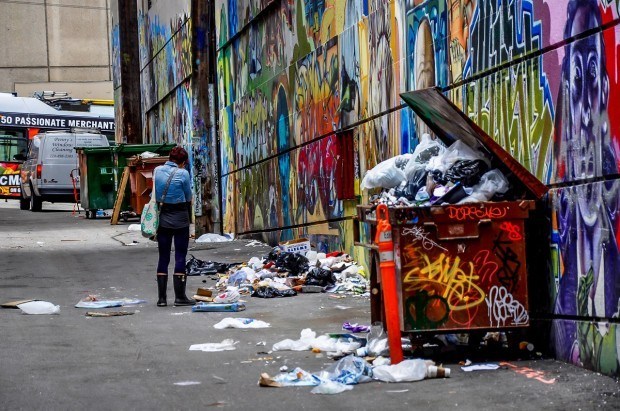 Picking up trash and recycling are good ways to save the environment on Earth Day