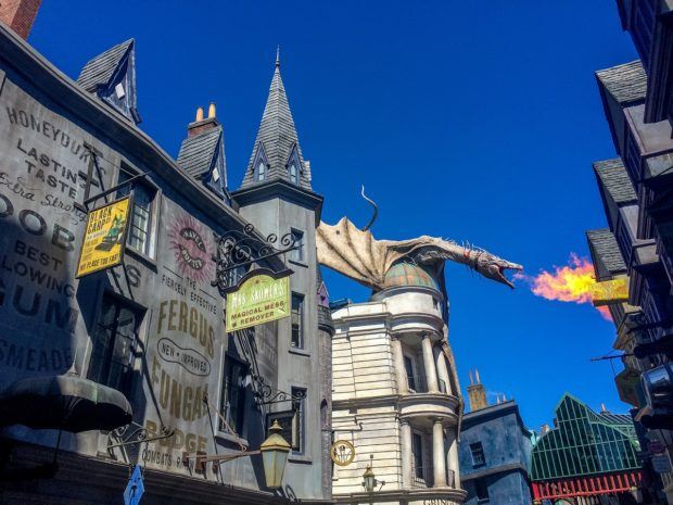 The dragon breathes fire periodically on his perch above Gringotts. Universal Florida is an Orlando must see.