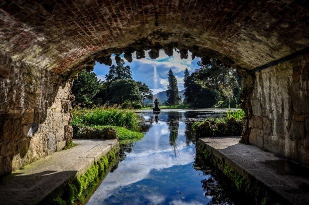 Pond and statue at Powerscourt Gardens and Estate, a great stop when touring Ireland by car
