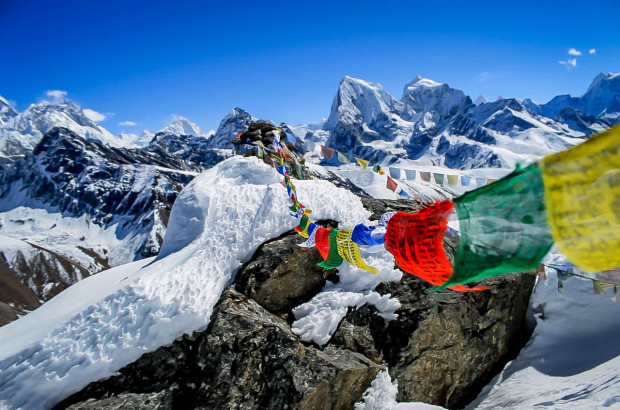 Reflections After The Nepal Earthquake Nepalese Prayer Flags high in the snow and ice covered Himalayas