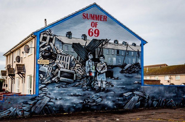 Belfast mural showing young boys in 1969--a mural tour should be part of any trips to Northern Ireland