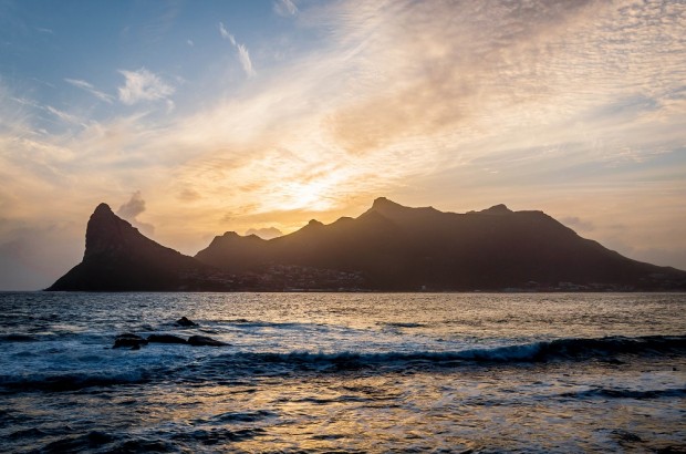 Regain Your Senses at Tintswalo Atlantic Cape Town Sunset over Sentinel Peak and Hout Bay from The Tintswalo Atlantic Cape Town lodge.