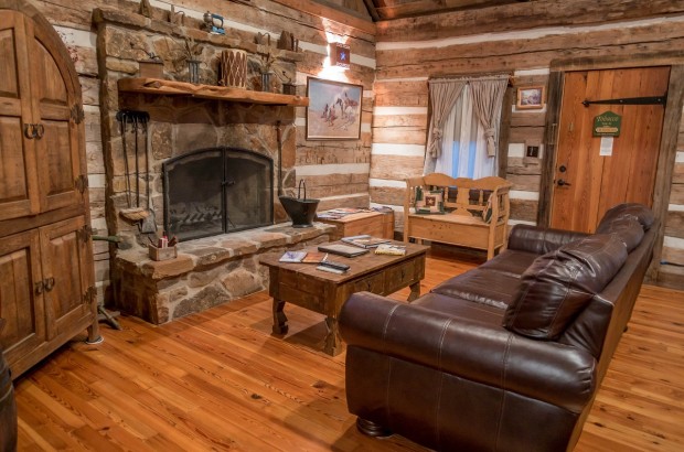 Rustic Comfort at the Cotton Gin Village Living room of the Llano cabin at the Cotton Gin Village