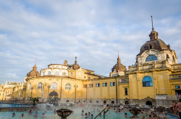 Dipping Into the Budapest Thermal Baths The Szechenyi Spa - one of over a dozen thermal baths in Budapest, Hungary and the largest spa complex in the world.