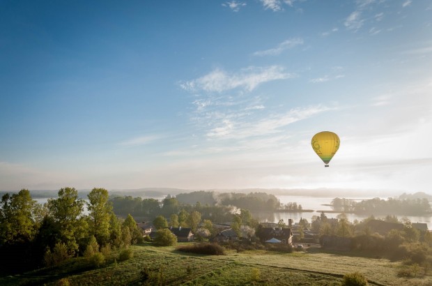 A Lithuanian Baptism Hot air balloon flight over Lithuania's Trakai Island Castle