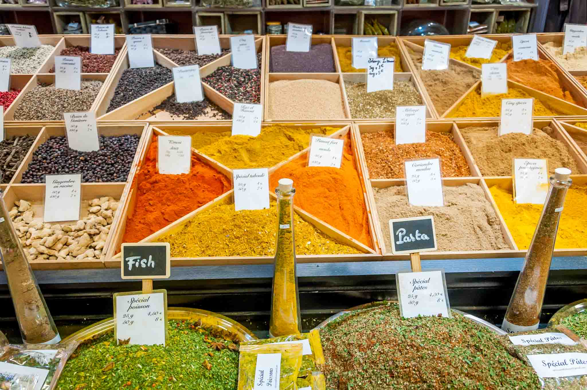 Spices for sale at the Les Halles market in Avignon, France. Visiting here is one of the best things to do in Avignon.