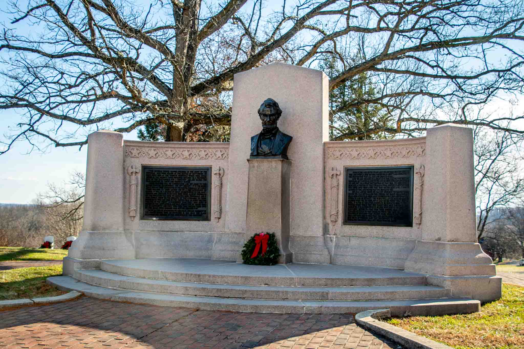 Stone memorial with bust of Abraham Lincoln at site of the Gettysburg Address