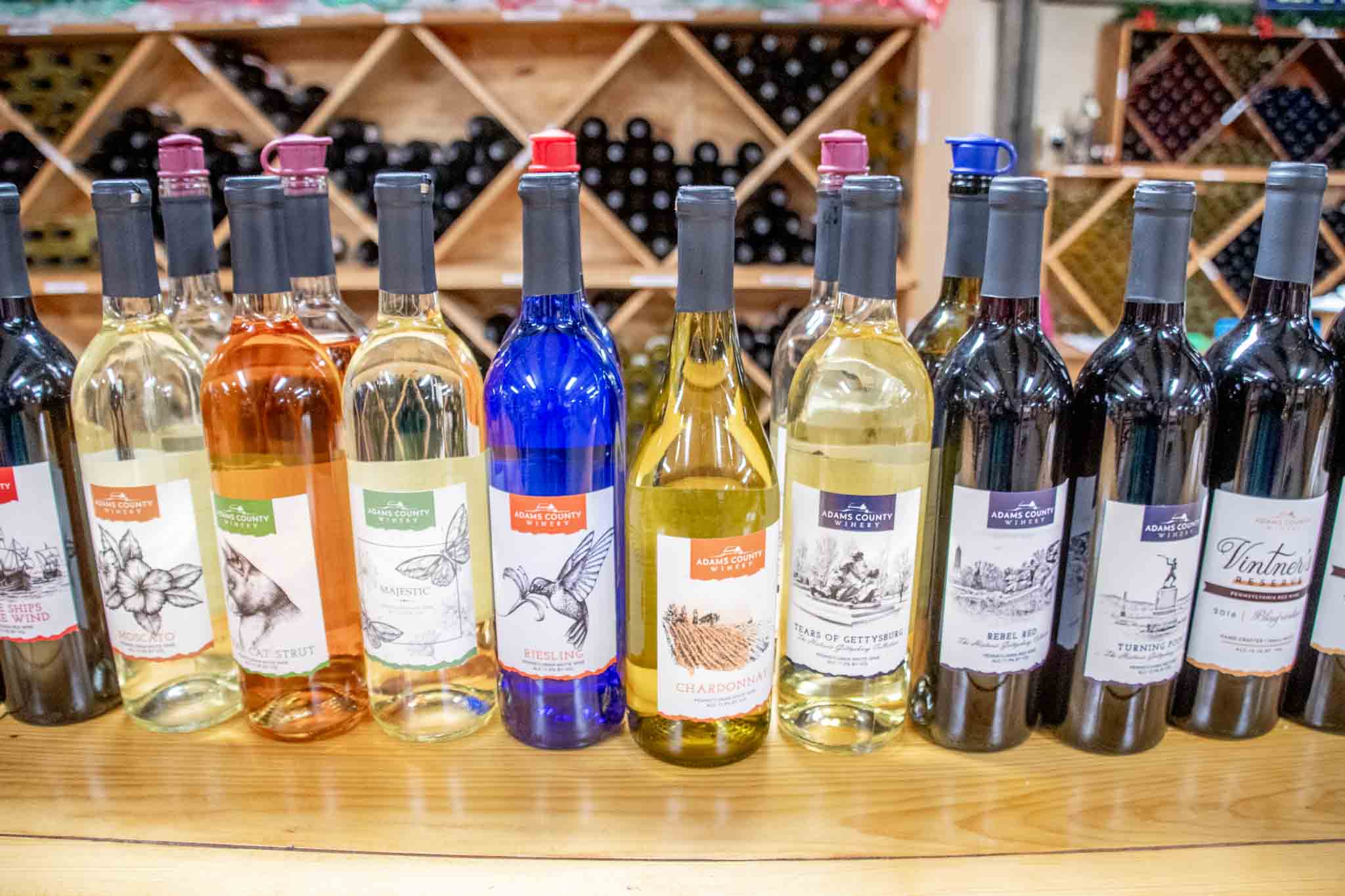 Wine bottles on a counter at Adams County Winery
