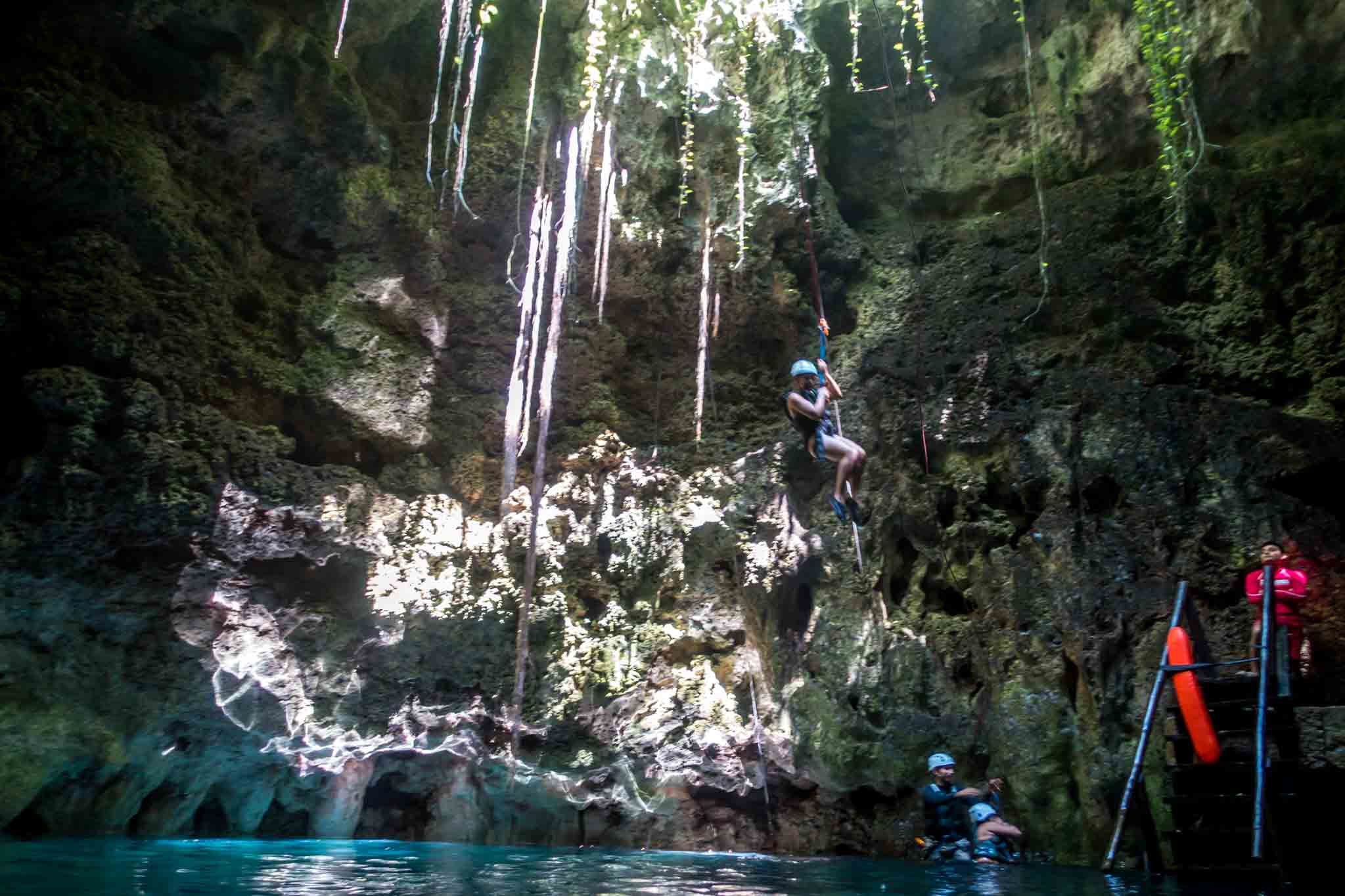 Rappelling into a cave cenote near Cancun. This is just one of four activities during a tour with Xenotes Oasis Maya.