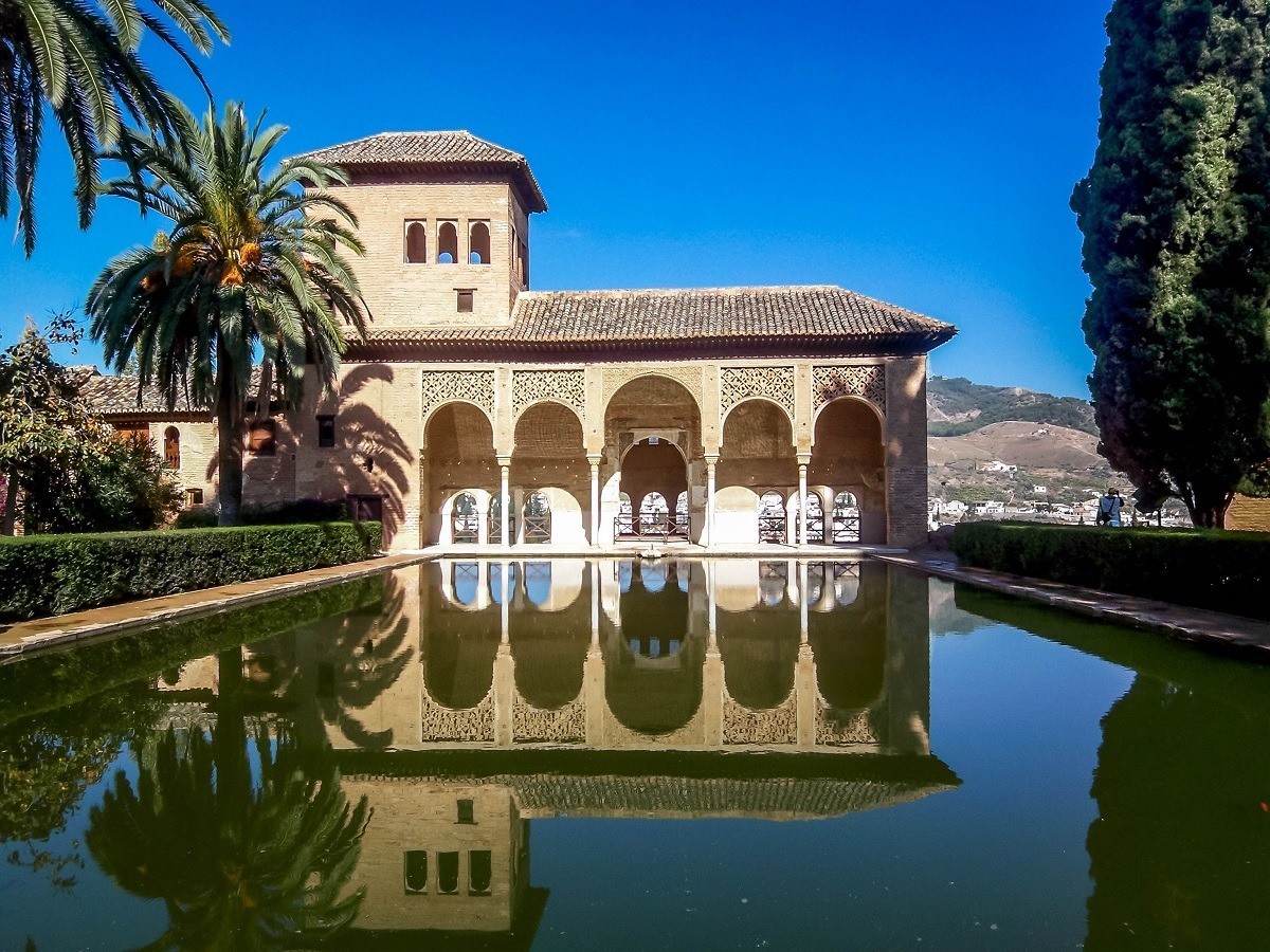 A tour of the Alhambra complex in Granada, Spain, takes several hours. The Moorish architecture makes the Alhambra one of the more unique palaces in Europe.