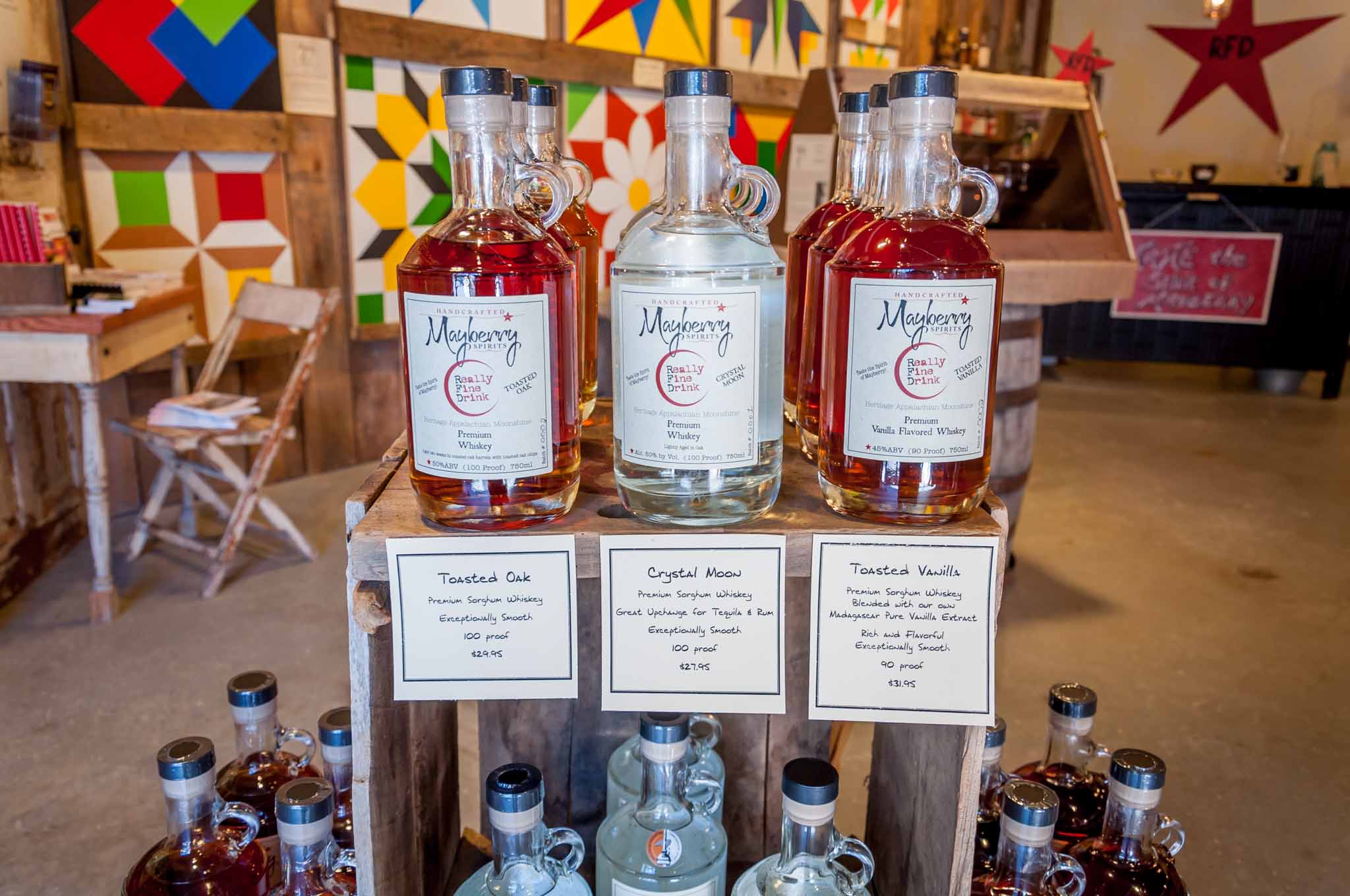 Whiskeys for sale at Mayberry Spirits. Visiting the distillery is one of the great things to do in Mount Airy, NC.