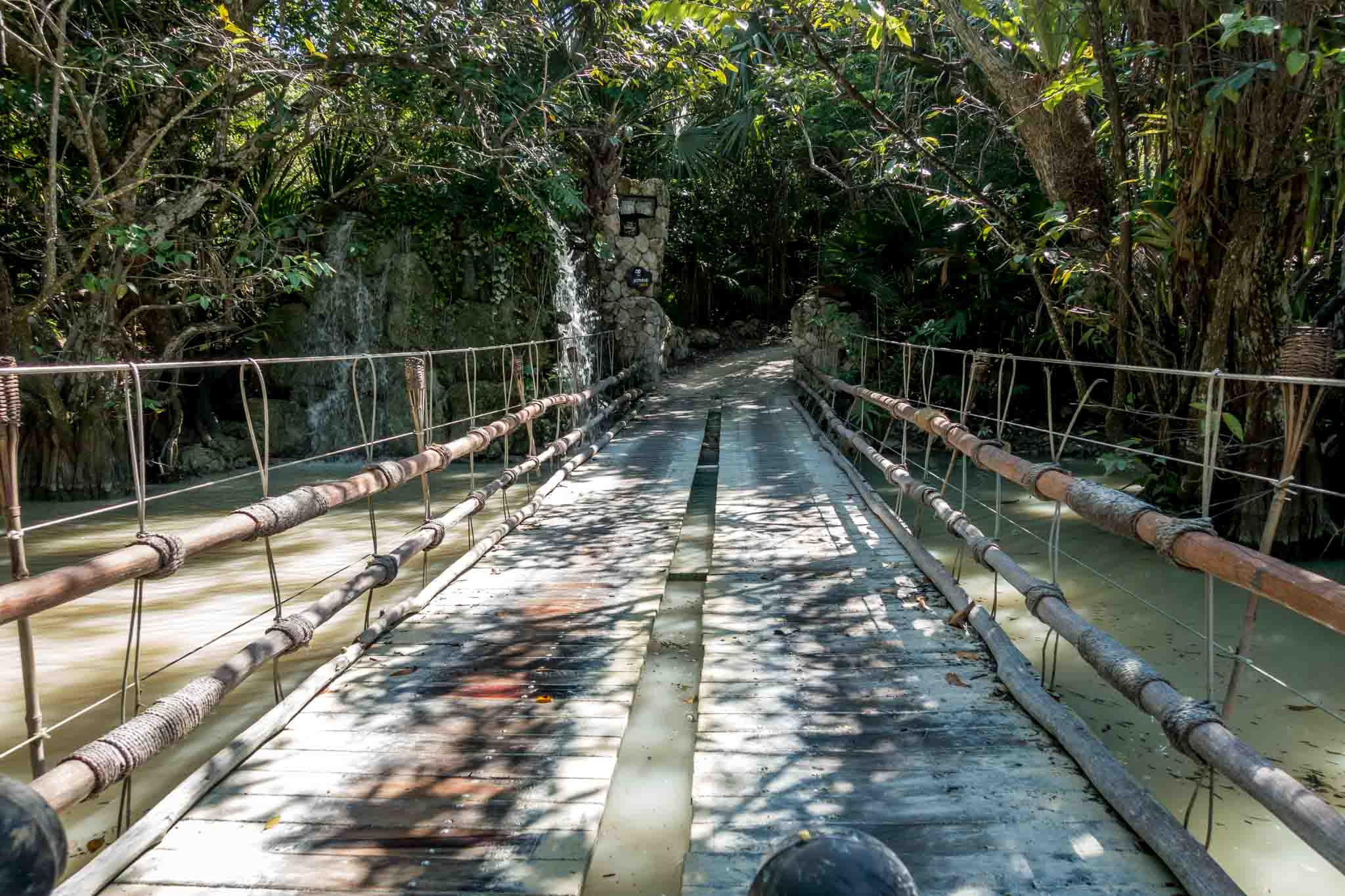 Crossing a bridge with very high water in an amphibious vehicle at Xplor adventure park in Mexico