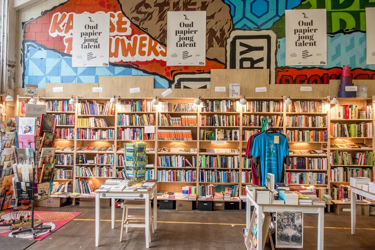 Shelves and tables full of books