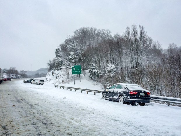 Cars spun out and abandoned in the snow