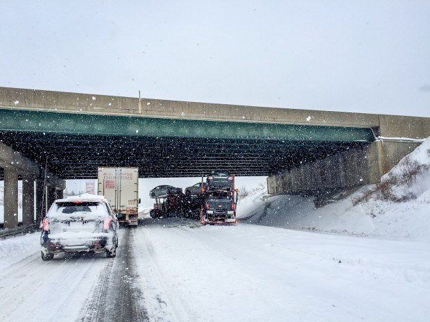 Jackknifed 18-wheelter and the building backup