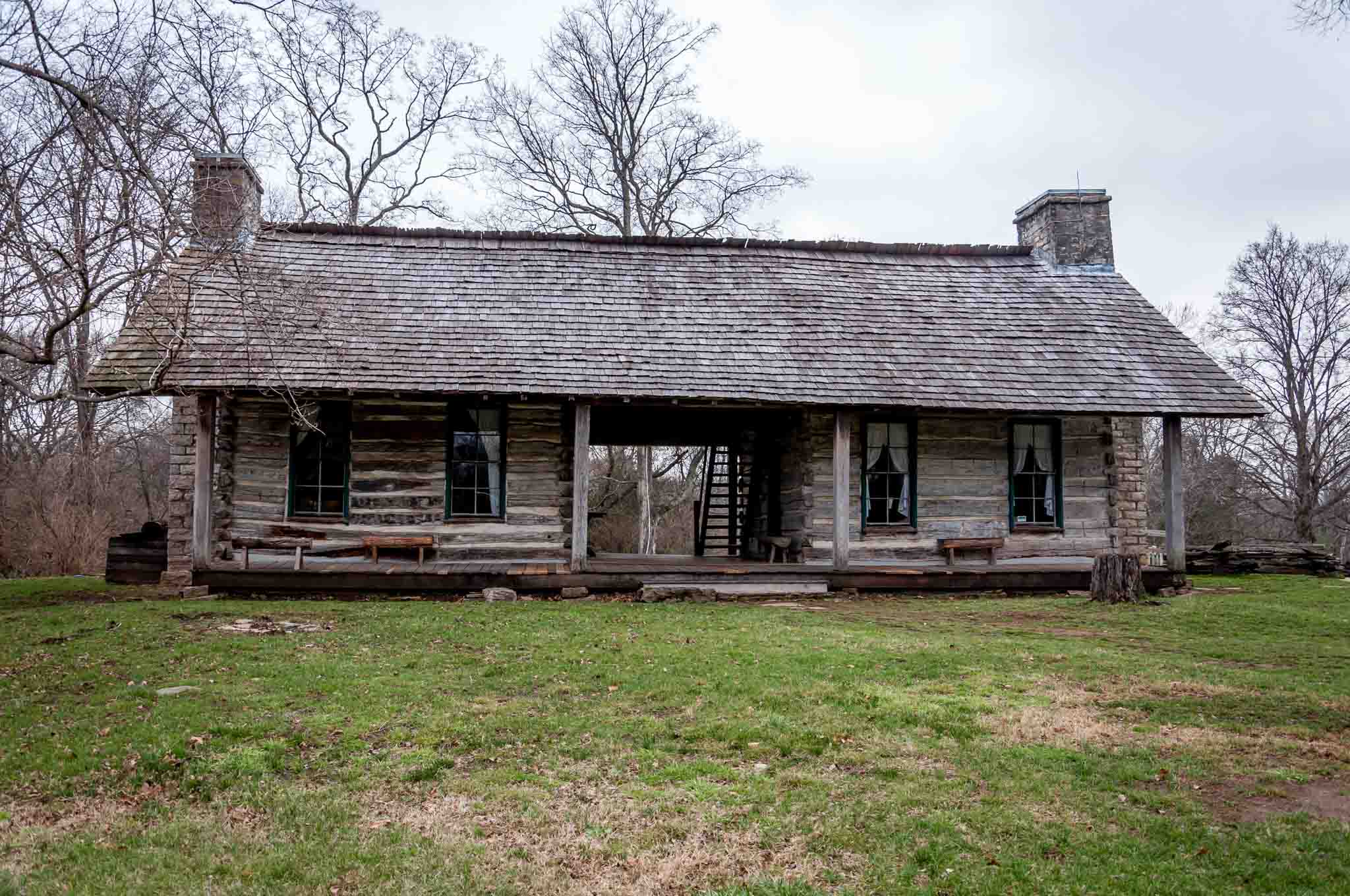 The original log cabin purchased by John Harding in 1807 still stands on the Belle Meade Plantation Nashville TN