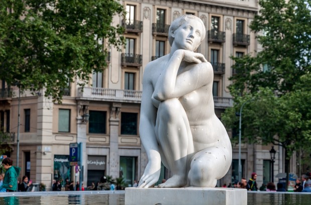 Falling in Love with Barcelona Statue in a fountain north of La Rambla in Barcelona, Spain