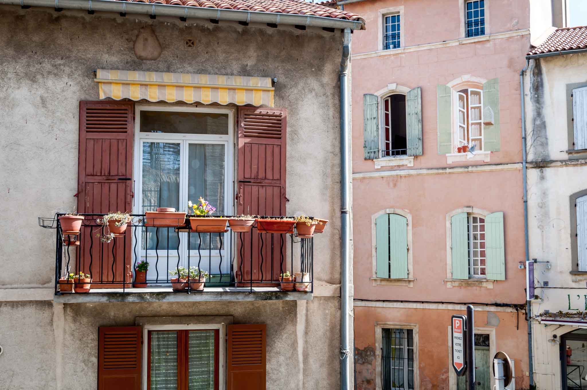 Colorful window shutters on a 10-day South of France itinerary