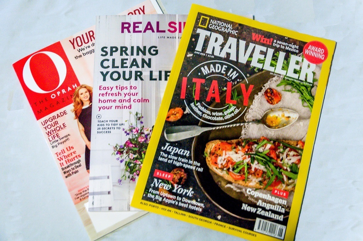 Even in the age of tablets and e-readers, magazines qualify as carry on essentials for us