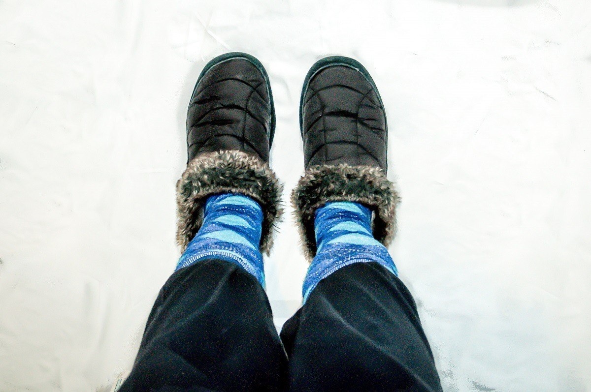 Slippers or comfortable footwear are one of our carry on essentials, especially on a long flight