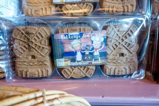 Windmill-shaped cookies in a clear package. These spiced speculaas cookies are usually Dutch Christmas food.