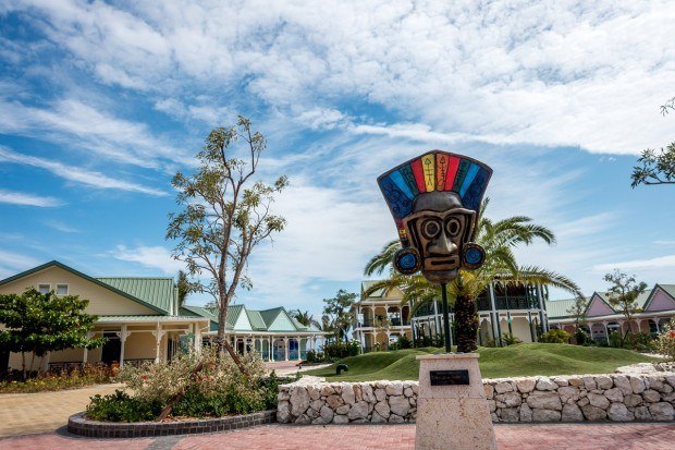 Giant carnival masks on display in the Amber Cove Carnival port