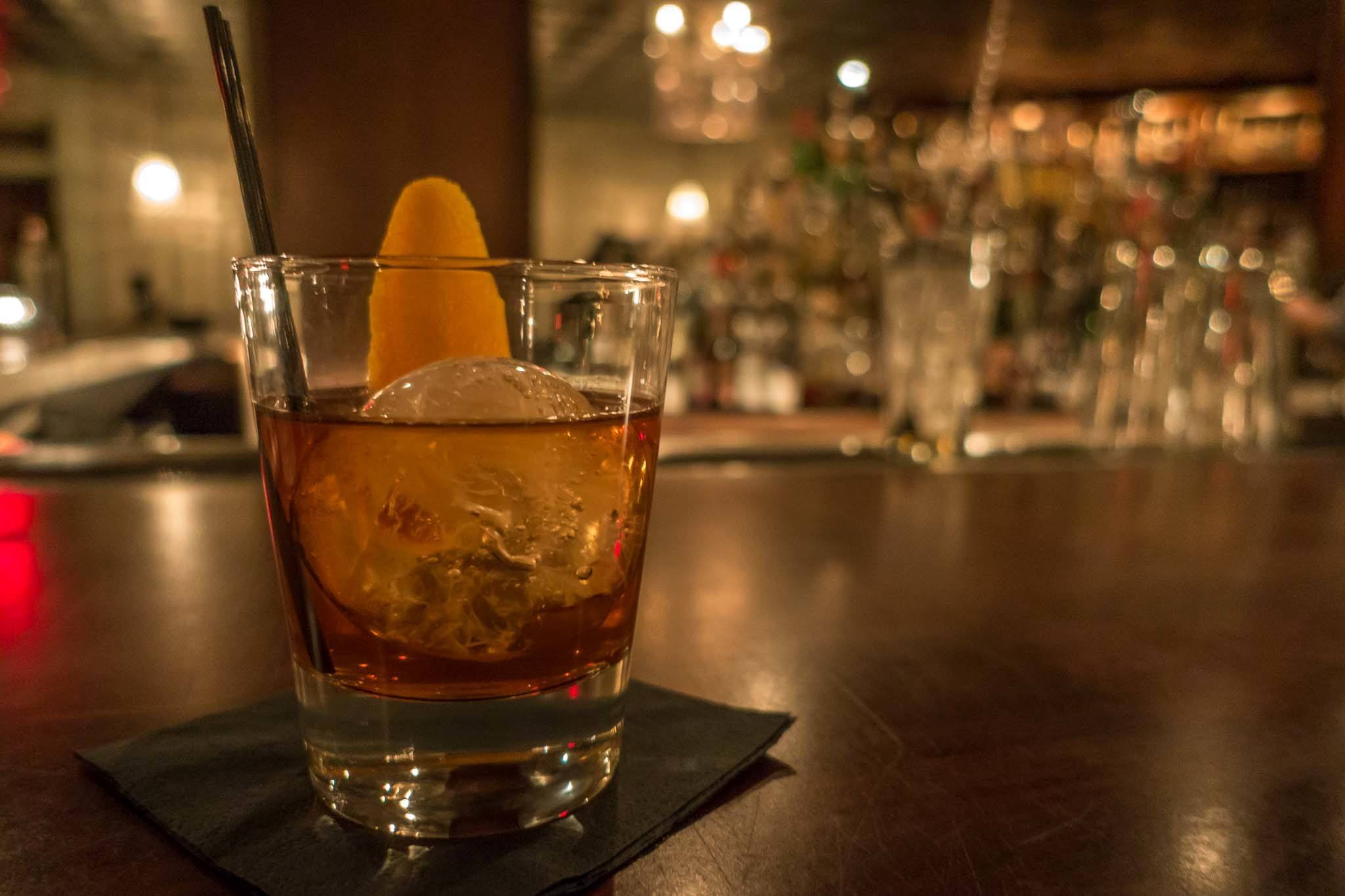 Whiskey cocktail on the bar at the Patterson House, one of the best places to visit in Nashville for cocktail lovers