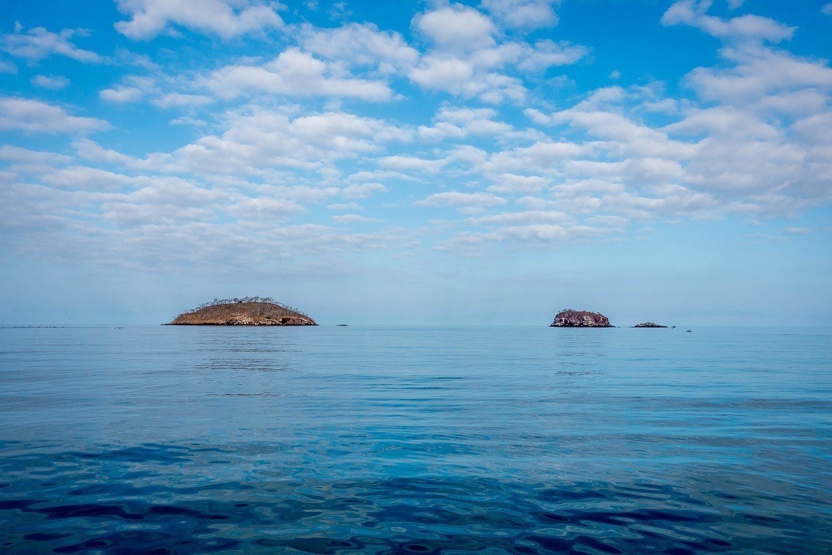 Tiny islands in the ocean off the coast of Isabela Island