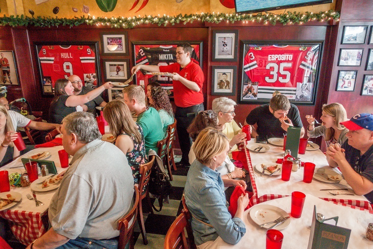 Diners inside Pizano's Pizza in Chicago, Illinois