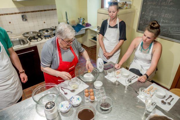 Making tiramisu in the cooking class Cooking with Nonna, offered in Rome, Italy by Eating Italy