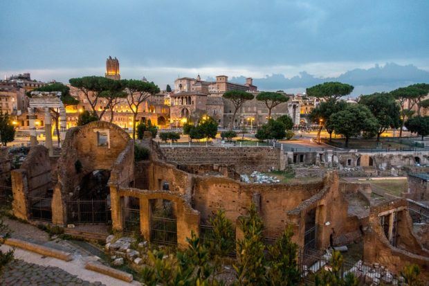Roman ruins, including the beautifully-lit Trajan's market, are stops on a Colosseum night tour