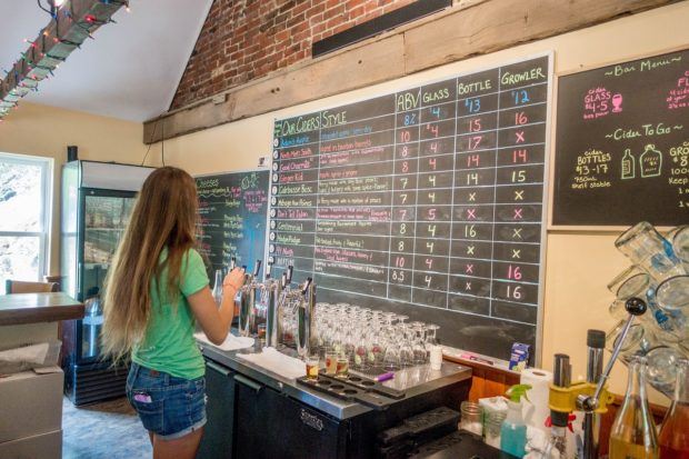 Pouring cider at Good Intent Cider in Bellefonte, PA