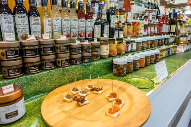 Vinegar, salsas, and jams at one of the Bologna markets