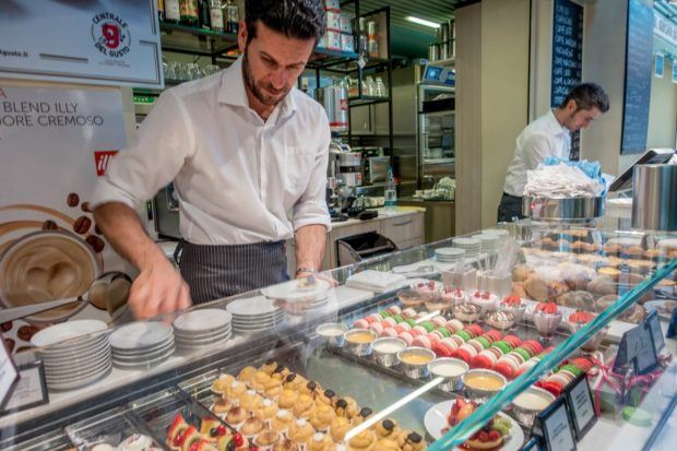 Take your pick of pastries at the stalls on the ground floor of Mercato di Mezzo, one of the indoor Bologna markets