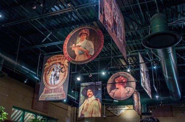 Posters showing the history of brewing in Pennsylvania hang in Otto's Brewery and Pub in State College