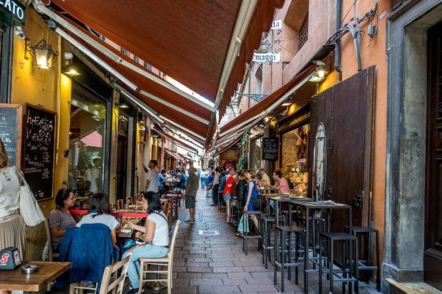 The narrow streets in the center of Bologna, Italy, are home to the Quadrilatero market
