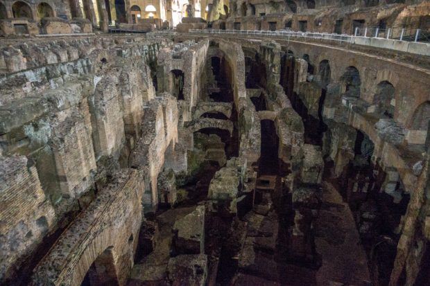 The underground tunnels of the Colosseum in Rome, Italy. You can visit on a Colosseum night tour.