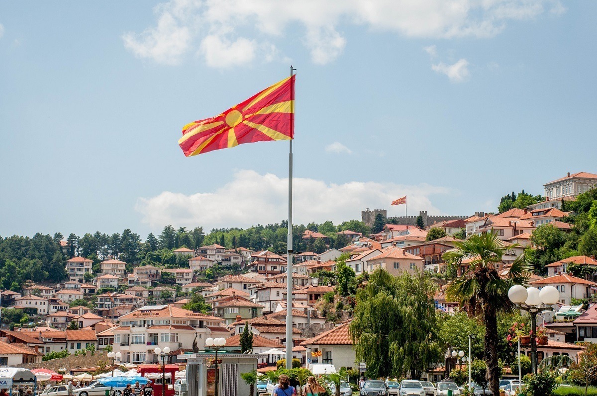 The town of Lake Ohrid and the North Macedonian flag