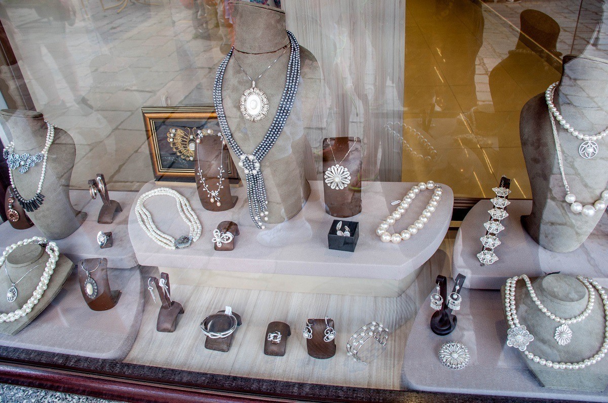 Shopping for Lake Ohrid pearls is a popular activity. Ohrid pearls are entirely man-made creations. They are created using an emulsion made from the scales of the Plasica fish, which is endemic to Lake Ohrid (and found nowhere else). The emulsion is then used to cover a pearl base made from ground shells. The result is a beautiful, shiny Lake Ohrid pearl.