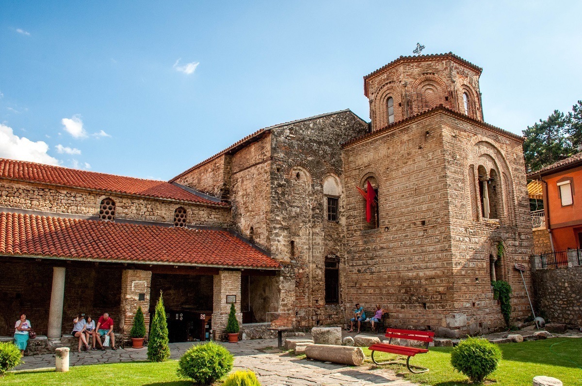 People sitting outside the St. Sophia Church in Ohrid