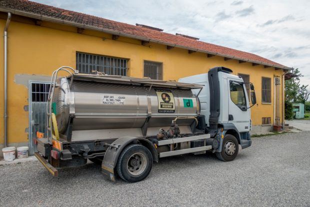 Milk delivery at a Parmigiano-Reggiano dairy in Parma, Italy