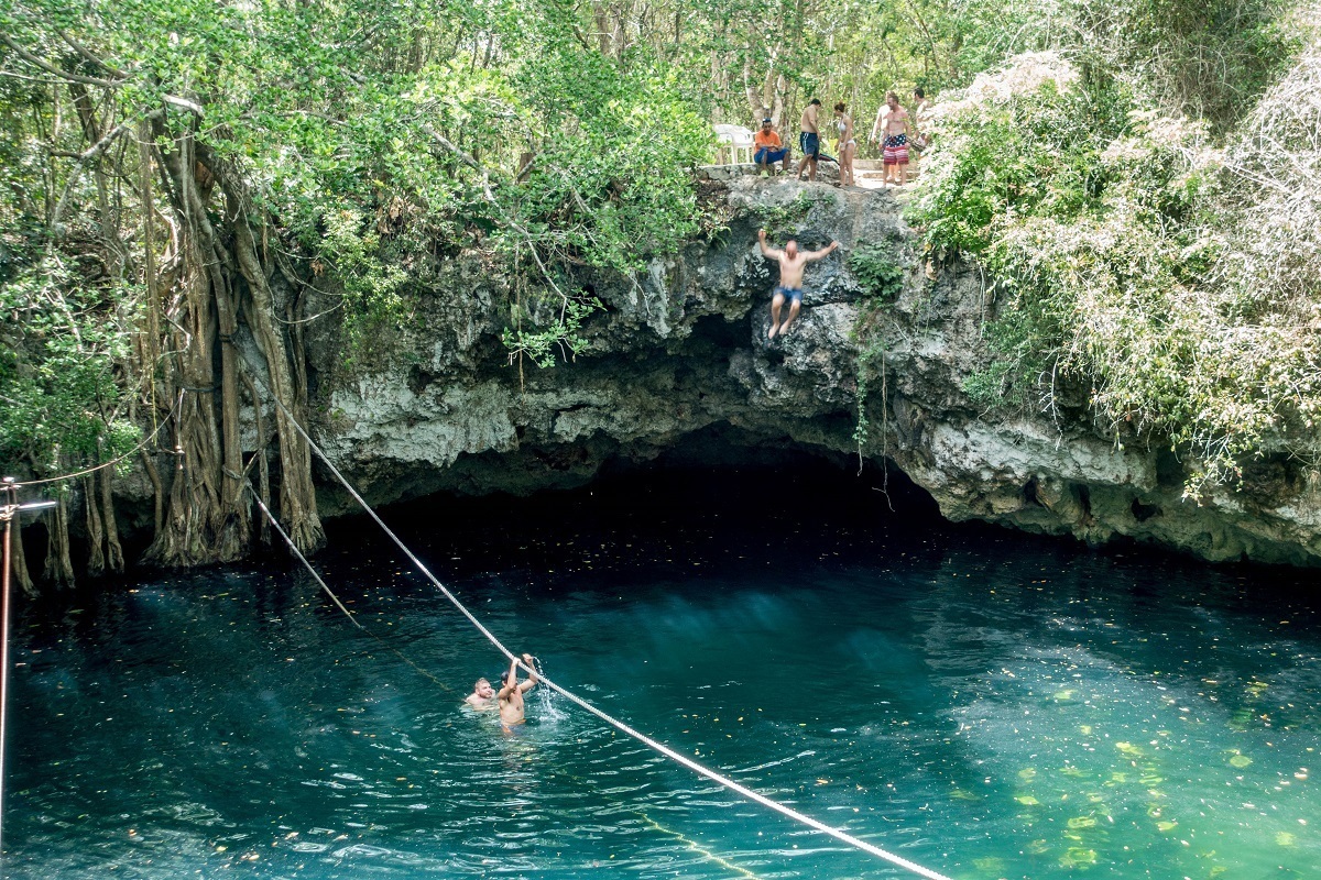 Cliff jumping at the Cenote Verde Lucero.