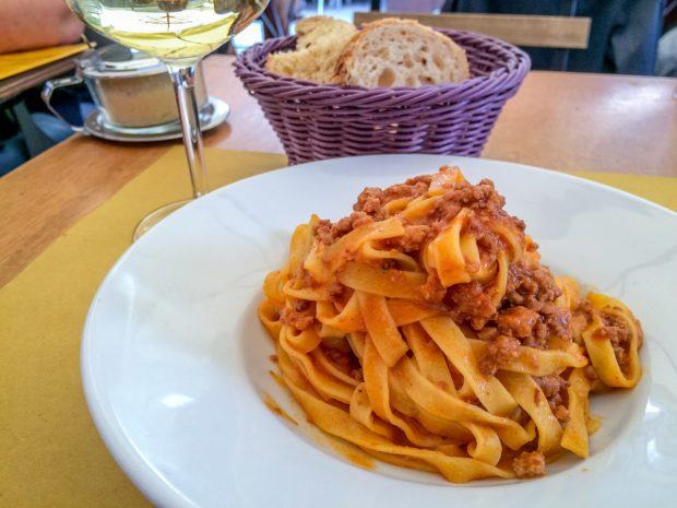 Tagliatelle al ragu is one of the traditional foods to try in Bologna. Sampling regional specialties is one of the best things to do in Italy.