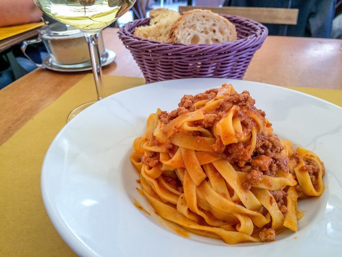 Tagliatelle al ragu is one of the traditional foods to try in Bologna. Sampling regional specialties is one of the best things to do in Italy.