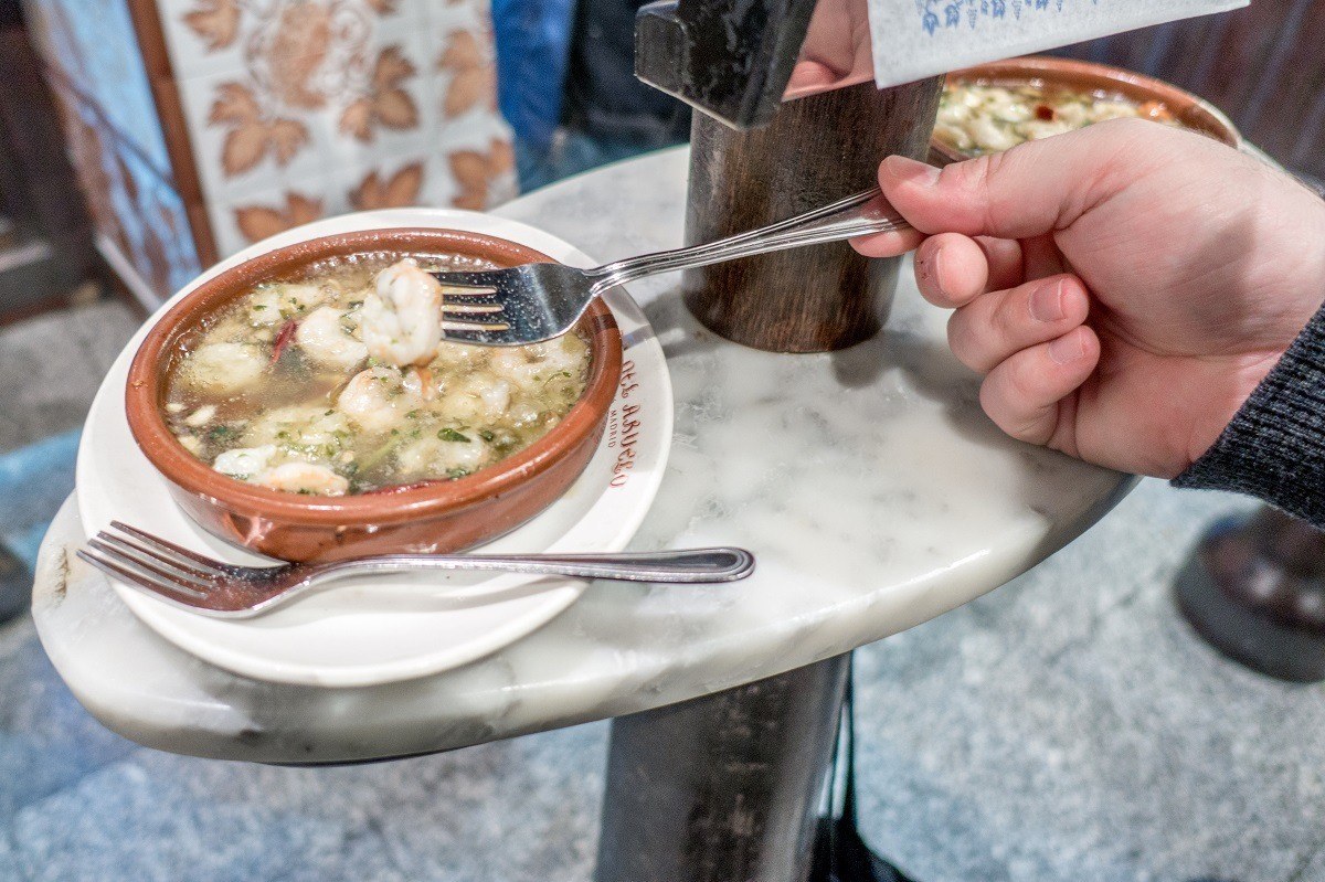 Shrimp and garlic is one of the typical tapas you can try on a food tour of Madrid