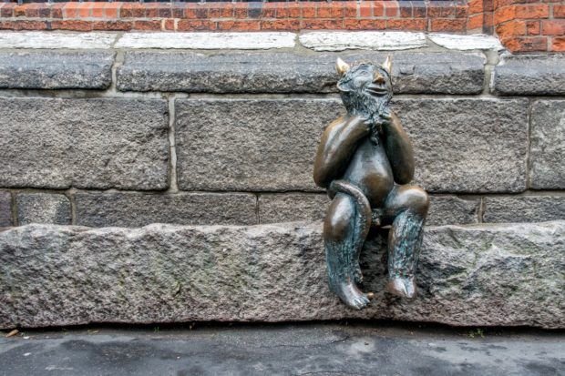 In the Hanseatic city of Lubeck, Germany, the Devil waits patiently for patrons leaving the wine bar near St. Mary's Church